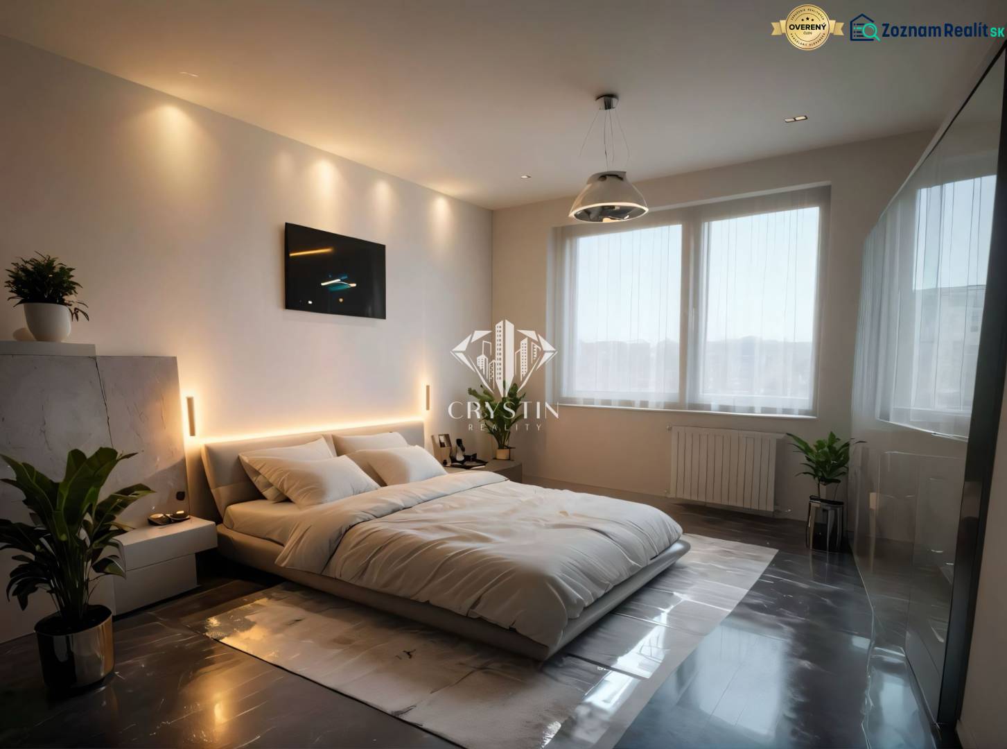 REZERVOVANÉ- Na predaj 3-izbový byt Žilina-Vlčince - Spálňa s podlahou s dreveným dekorom, veľká posteľ, rastliny a zapustené osvetlenie.