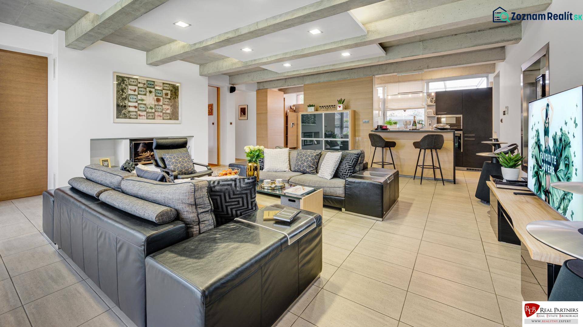 Predaj moderná 5 izbová vila, 265 m2, pozemok 953 m2, bazén,BA II. - Obývačka na ulici Imelová: štýlové zariadenie, kuchyňa, pohodlné sedenie, otvorený priestor vo vile.