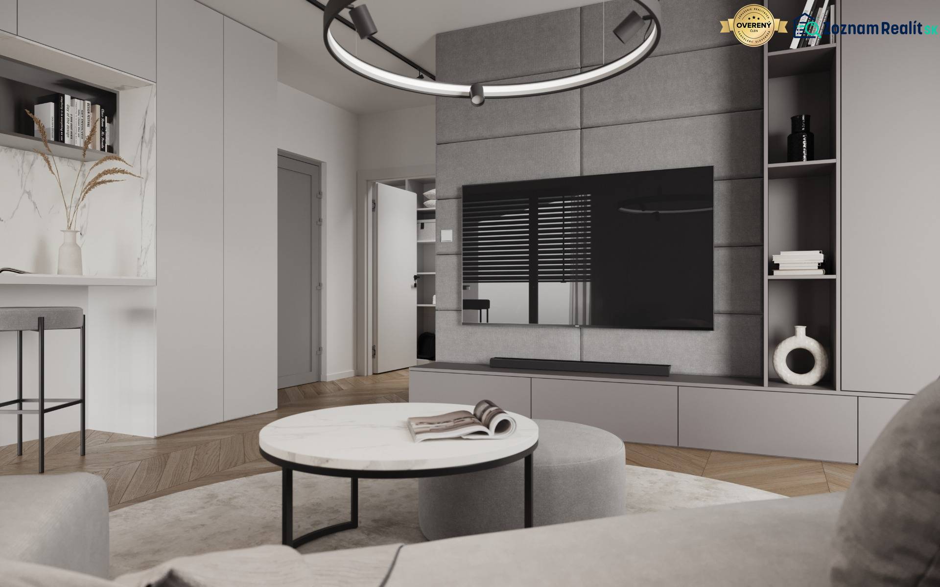 Novostavba: 2-izbový byt, 12 km od Viedne, Münichsthal - Interiér 2-izbového bytu s televízorom, stolíkom a svetlými stenami na ulici Münichsthal.