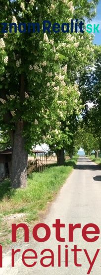 Stavebný pozemok v tichej lokalite mesta Lučenec - Cesta lemovaná kvitnúcimi stromami v Lučenci, vhodná pre Pozemky - bývanie.