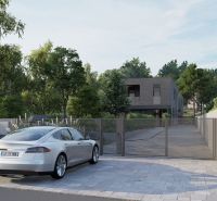 Stavebné pozemky s projektom 2 samostatných RD v obci Baška-časť Maša - Dom v zeleňou obklopenom prostredí, stojí pred ním auto, ideálny pozemok-bývanie.