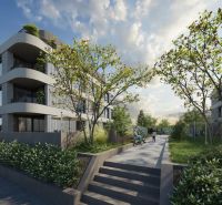 Rezidencia Karpatská (C.3E), 2i byt 60 m2 s loggiou 6 m2, TN - Budova s modernou architektúrou obklopená zeleňou na Karpatskej ulici v Trenčíne.