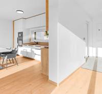 REZERVOVANÉ Krásny 4i RD 105m2, smart systém, záhrada, úplne nový - Interiér rodinného domu s jedálenským kútom a kuchyňou v svetlých farbách.