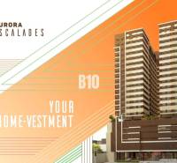 Predaj 1-izbového bytu, Bratislava I - Budova s moderným dizajnom, logo Aurora Escalades, text 