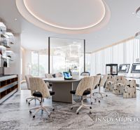 EMBASSY LIFE PATTAYA - Interiér kancelárie s kruhovým stolom, počítačmi a moderným osvetlením. Výstavba bytov.