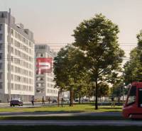 2-izbový byt Slnečnice POP pri novej električke do centra! - Budovy na ulici Labutia, Bratislava V, so zeleňou a električkou v popredí.