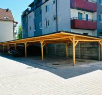 Moderný a priestranný 2i byt v novom projekte, Geologická - Parkovisko so zastrešením pri bytovom dome na Geologickej ulici v Bratislave - Podunajské Biskupice.