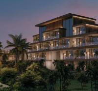 HOTELOVÝ SUITE V LUXUSNOM ZANZIBARSKOM KOMPLEKSE - Pohľad na viacpodlažný rodinný dom s palmami na ulici Nungwi v Zanzibar North.