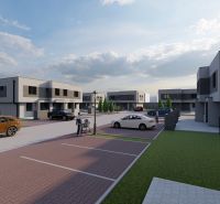  SO-07-A  Priestranný 4-izbový RD so záhradou a 3 parkovacími miestami - Ulica s novými domami na Triblavinskej v Chorvátskom Grobe, parkovanie a ľudia v exteriéri.
