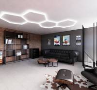 Exkluzívne garáže v projekte PARK3BA, Triblavina, Bratislava - Obchodné priestory s pohodlnými sedačkami, tehlovou stenou a moderným nábytkom.