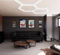 Exkluzívna garáž ( typu B) v projekte PARK3BA, Triblavina, Bratislava - Kožená sedačka v obchodných priestoroch s vintage dekoráciami na stene.