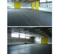 Skladové priestory 770 m2 a 792 m2 v Piešťanoch - Priestory skladu s halami s veľkými žltými dverami a oknami.