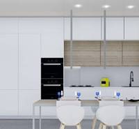 Ekologická novostavba Calasparra, 77-117m2, 2-3spálne - Kuchyňa rodinného domu s jedálenským stolom, bielymi skrinkami a rastlinou v kvetináči.