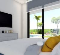 Ekologická novostavba Calasparra, 77-117m2, 2-3spálne - Spálňa v rodinnom dome s posteľou, televízorom a veľkými oknami s výhľadom na záhradu.