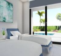 Ekologická novostavba Calasparra, 77-117m2, 2-3spálne - Spálňa s dvoma posteľami a výhľadom na záhradu v rodinnom dome.