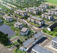KOLAUDUJEME! Predaj 3-izb. bytu , Nová Tehelňa, Senec (A1102) - Pohľad zhora na novú mestskú štvrť s bytovkami a rybníkom.