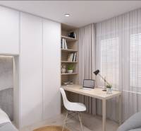 RODINNÝ DOM – dvojdom, na Ul. Ivana Braunera v Nitre - NOVOSTAVBA.  - Pracovný kút v rodinnom dome s písacím stolom, kreslom a knihami na policiach.