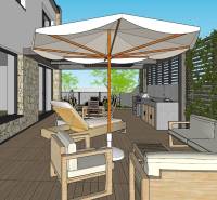 NA PREDAJ 5i rekreačný RD | Pekná cesta | Lesopark Rača  - Terasa s kamennou stenou, slnečníkom a kuchynským kútom v rodinnom dome.