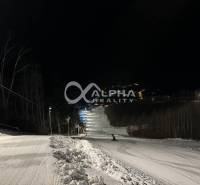 Stavebné pozemky v lokalite Slnečná úboč, Levočská Dolina - Nočná lyžiarska trať v Levočskej doline, ideálna pre rekreáciu a bývanie.