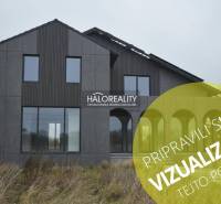 Predaj, rodinný dom Dolný Pial - VO VÝSTAVBE - Rodinný dom v Dolnom Piale s tmavosivou fasádou a rozľahlými oknami.