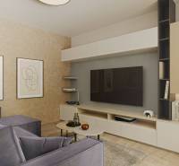 Prémiové byty s vysokým investičným potenciálom - Interiér obývačky s pohodlným gaučom, televíziou, obrazmi a podlahou s dreveným dekorom.