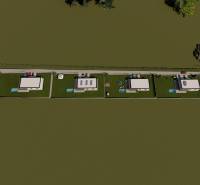 Na predaj : stavebný pozemok  Vranov nad Topľou - Letecký pohľad na plochy pre bývanie na Lomnickej ulici vo Vranove nad Topľou.