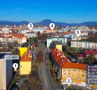 PREDAJ | 3i tehlový BYT, 90 m², centrum PO, balkón , Klimatizácia ... - Letecká snímka z Prešova s pohľadom na Budovateľskú ulicu a okolitými 3-izbovými bytmi.