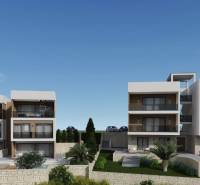 ☀Ciovo/Trogir(HR)-moderné byty v novostavbe s výhľadom na more☀ - Rekreačné apartmány v meste Ciovo so súčasnou architektúrou, obklopené zeleňou a kamennými múrmi.