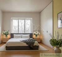 Rodinný dom v srdci Štiavnických vrchov, Štiavnické Bane. - Spálňa v rodinnom dome s posteľou, skriňami a podlahou s dreveným dekorom.