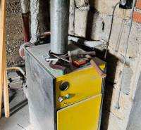 Na predaj 3 i RD v Partizánskom – Veľké Bielice, pozemok 1149 m2 - Kotle v rodinnom dome, s náradím na vrchu, v nedokončenej miestnosti.