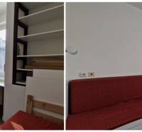 AstonReal: EXKLUZÍVNE predaj rodinný dom Spišská Nová Ves - Ferčekovce - V rodinnom dome sú biele skrinky, pracovný stôl a červená sedačka.