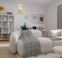 PREDANÉ - 4 izbový byt s loggiou v Petržalke - Svetlá obývačka v 3-izbovom byte s pohodlným nábytkom a poličkami plnými kníh.