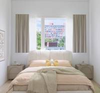 PREDANÉ - 4 izbový byt s loggiou v Petržalke - Spálňa v 3-izbovom byte s posteľou a závesmi, rastlinou a obrazmi na stene.