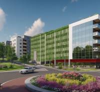 1i - 2i - 3i BYTY V NOVOSTAVBE | NITRA - MLYNARCE - Kmeťova ulica v Nitre so zeleňou a modernými budovami, 1-izbový byt v okolí.