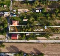 POZEMKY - ZÁHRADY OD 12.780€ | BLESOVCE  - Letecký pohľad na pozemky na bývanie v Blesovciach pozdĺž ulice blesovce.
