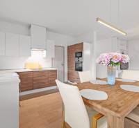 PRENÁJOM 3i byt s veľkorysou terasou a súkromím – Staré Grunty - Kuchyňa v 3-izbovom byte s podlahou s dreveným dekorom, jedálenským stolom a kvetmi.