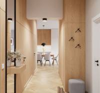 PROJEKT POD VINICOU | 4-IZB. BYT, UZAVRETÝ AREÁL, HOLOBYT, NOVOSTAVBA - Chodba v 4-izbovom byte s podlahou s dreveným dekorom, vedúca k jedálni.