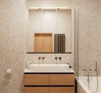 PROJEKT POD VINICOU | 4-IZB. BYT, UZAVRETÝ AREÁL, HOLOBYT, NOVOSTAVBA - Kúpeľňa v 4-izbovom byte so skriňou s dreveným dekorom a vaňou.