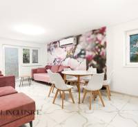 NADŠTANDARDNÁ REKREAČNÁ CHATA | DUCHONKA  - Obývacia miestnosť v Chate s kvetinovou tapetou, ružovými sedačkami a jedálenským stolíkom.