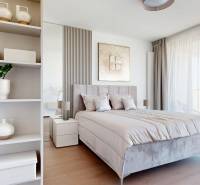 RIVERS | Butikovo zariadený ateliér na 32. poschodí Eurovea Tower - Svetlá spálňa v 2-izbovom byte s jemným dekorom a podlahou s dreveným dekorom.