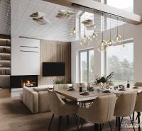 Únik z mesta, kde sa moderná architektúra stretáva s divokou prírodou? - Interiér chaty s jedálenským stolom, krbom a podlahou s dreveným dekorom, osvetlený lustrami.