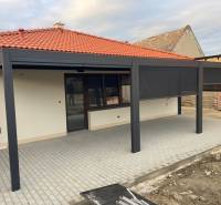 Rodinný dom na Devätinovej ulici na prenájom - Rodinný dom v Bratislava - Podunajské Biskupice na Devätinovej ulici má krytú terasu.