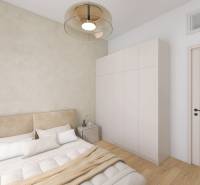 TOP - Rodinný dom s veľkým pozemkom - Dolný Hričov - Spálňa v rodinnom dome s podlahou s dreveným dekorom, posteľou, skriňou a priestorovým osvetlením.