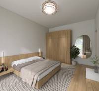 TOP - Rodinný dom s veľkým pozemkom - Dolný Hričov - Spálňa v rodinnom dome s manželskou posteľou, šatníkovou skriňou a podlahou s dreveným dekorom.