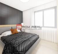 Predaj 3-izbový byt od 184 999 € v projekte Rezidencia Potôčik - Spálňa v 2-izbovom byte s podlahou s dreveným dekorom a šedým čalúneným nábytkom.