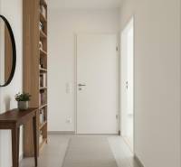 4-izbový rodinný dom Galanta – HODY - bez rezervačnej zálohy - Vstupná chodba v rodinnom dome so zrkadlom, policou a kobercom.