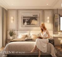 2 SPÁLŇOVÝ APARTMÁN BIANCANA PHUKET - Spálňa v 3-izbovom byte s posteľou, obrazom a ženou čítajúcou knihu.