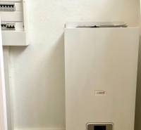 I Kompletne zrekonštruovaný nebytový priestor v Novom Meste - Kancelárie s elektrickým rozvádzačom a kotlom na stene.