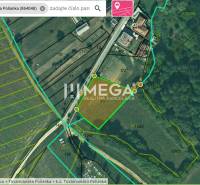 ZNÍŽENIE CENY-PREDAJ VEĽKÉHO POZEMKU (7.048 m2) v  obci Tovarnianska P - Letecký pohľad na pozemky - bývanie v Tovarnianskej Polianke obklopené cestou a políčkami.