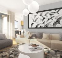 PREDAJ NADŠTANDARDNÉHO 4 IZB.BYTU V NOVOM KOMPLEXE-VINICE-150,18 m2 - Elegantná obývačka s veľkým oknom, obrazom a pohodlnými sedačkami v 4-izbovom byte.
